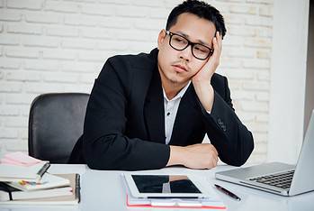 business man unhappy businesspeople sitting in office